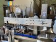 Etiquetadora automtica para botellas y tarros cilndricos planos Maqmundi