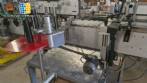 Etiquetadora autom�tica de doble cabezal para botellas planas Bauch Campos
