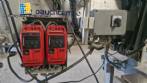 Etiquetadora automtica de doble cabezal para botellas planas Bauch Campos
