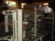 Llenadora lineal con sistema de termoformado