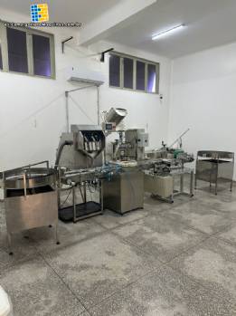 L�nea de envasado, conteo y tapado de c�psulas y otros productos