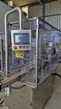 L�nea de llenado completa con m�quinas Tecman Nelpas Tecnoenvase Tudela para el llenado, etiquetado, taponado y posicionamiento de botellas de l�quidos cosm�ticos.
