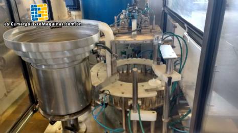 Llenado rotativo con tapadora Wada