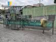 Llenadora lineal autom�tica de 6 boquillas con enjuagadora y tapadora. Capacidad: 1800 botellas por hora.
