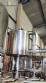 Llenadora rotativa gravimtrica de acero inoxidable con cabina