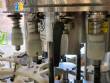 Llenadora rotativa gravim�trica de acero inoxidable con cabina