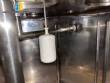 Llenadora rotativa gravim�trica de acero inoxidable con cabina