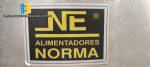 Enroscadora de botellas y tarros con sistema automtico de alimentacin de tapones