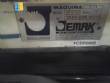 Sellador de cajas de cartn con pegamento termofusible Jemak