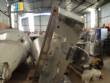 Elevador de posicionamiento y llenado de tapas para la industria de maquinaria SLP