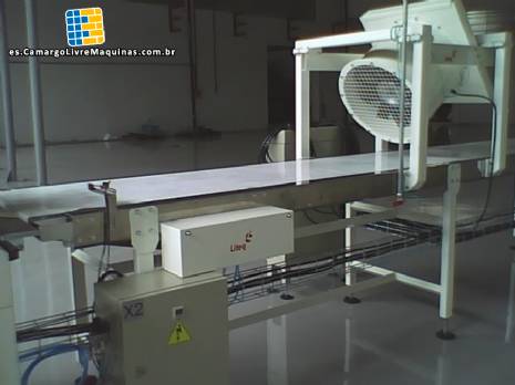 Máquina de moldeo rotativa para la producción de dulce de leche y otros productos alimenticios Máquina de moldeo rotativa para la producción de dulce de leche y otros productos alimenticios